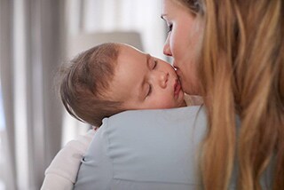 Mother holding baby