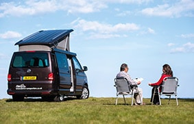 two older people traveling